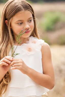 witte jumpsuit bloemen schouders meisjes Linea Raffaelli communiecollectie lentefeestcollectie 2024 